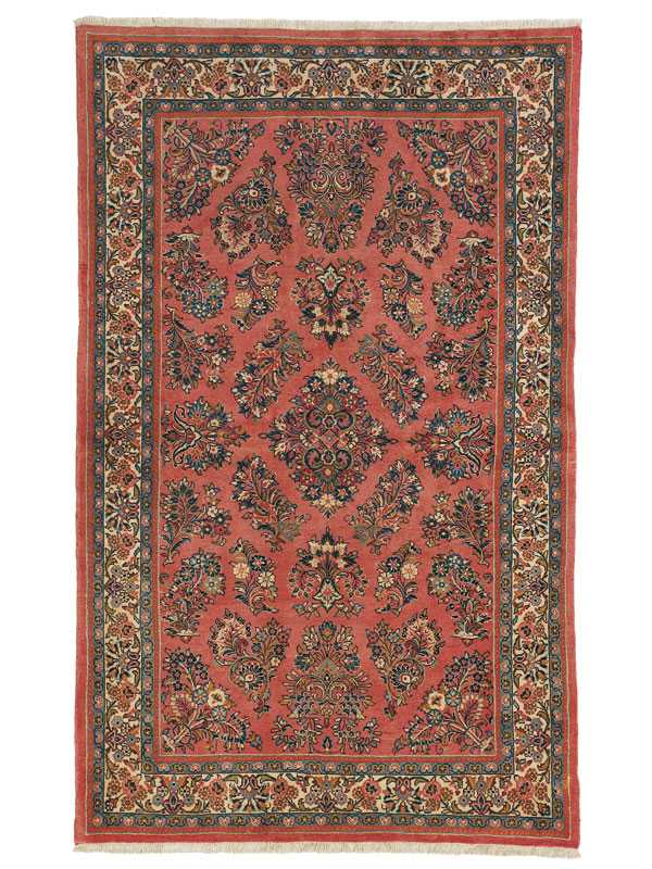 Tappeto persiano saruq con intricati dettagli decorativi floreali su campo rosso e sullo spesso bordo bianco