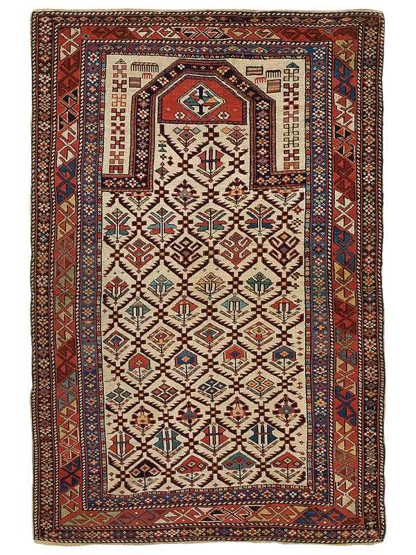 Tappeto shirvan antico con motivi decorativi stilizzati e geometrici rossi, blu e verdi su campo bianco e sullo spesso bordo rosso