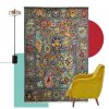 tappeto contemporaneo artik con abbinamenti poltrona gialla e applique da pavimento